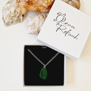 silver necklace with sea glass in box