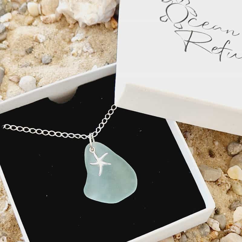 sea glass necklace in ocean refund box