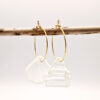 Andrina Golden Hoops, sea glass strung on golden hoops hanging on a wooden stick