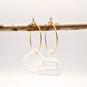 Andrina Golden Hoops, sea glass strung on golden hoops hanging on a wooden stick